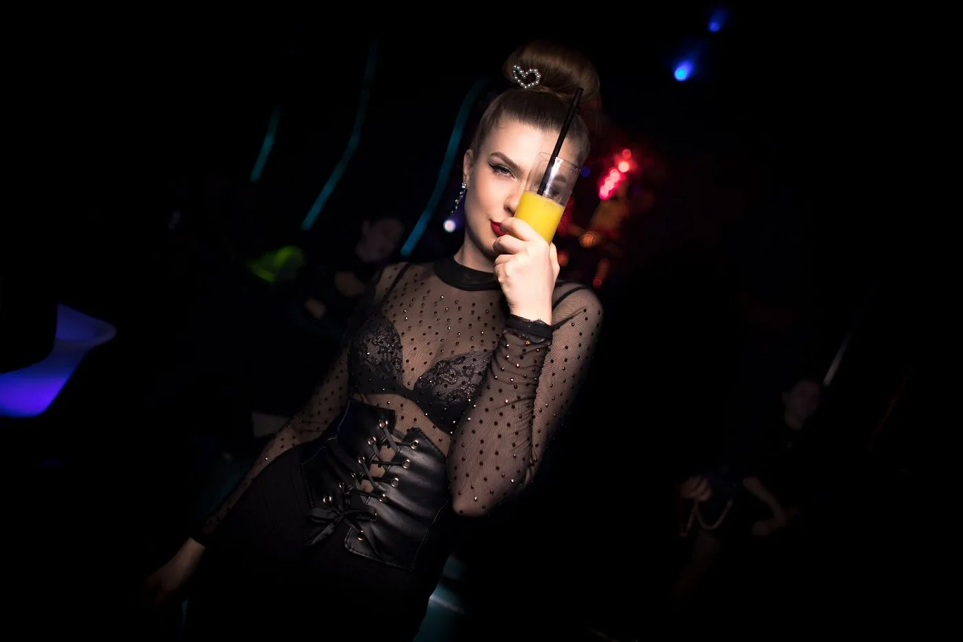 Guest in a moody dark portrait at Chameleon Club Dubai
